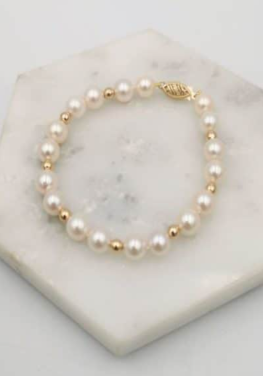 Allegra warm white cultured seawater pearl bracelet with yellow gold spacer beads and clasp