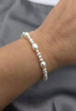 Evie warm white oval seed and rice freshwater pearl bracelet