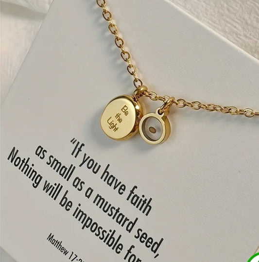 Gold-tone Be the Light faith necklace from the Have a Little Faith collection