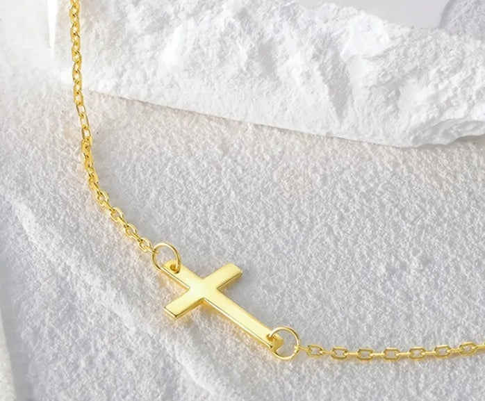 Gold-tone side cross necklace from the Have a Little Faith collection
