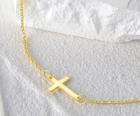 Gold-tone side cross necklace from the Have a Little Faith collection