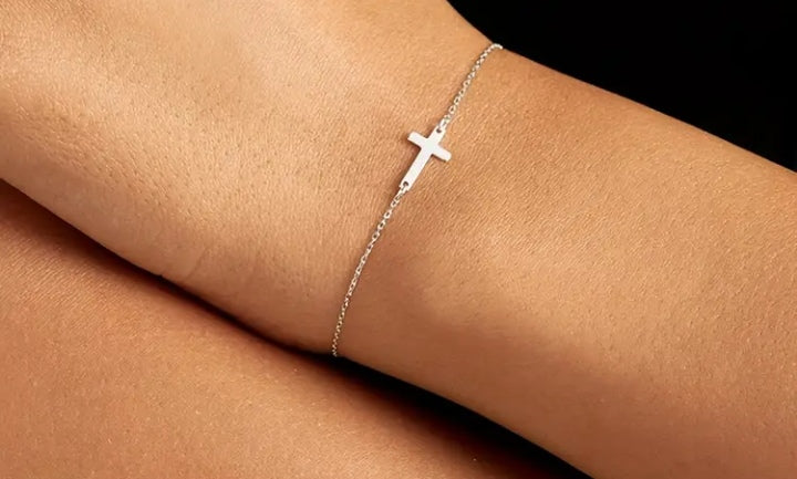 Silver-tone sideways cross bracelet from the Have a Little Faith collection